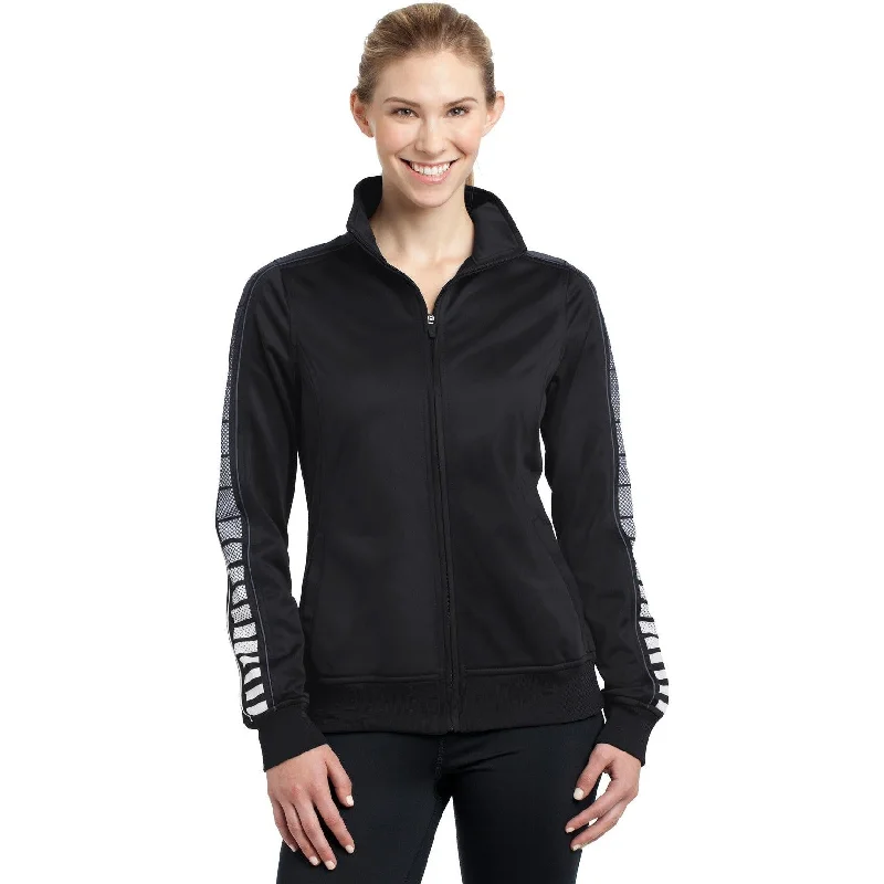 Long jackets with a drawstring waist for a customizable fitCLOSEOUT - Sport-Tek Ladies Dot Sublimation Tricot Track Jacket Long jackets with a drawstring waist for a customizable fitCLOSEOUT - Sport-Tek Ladies Dot Sublimation Tricot Track Jacket