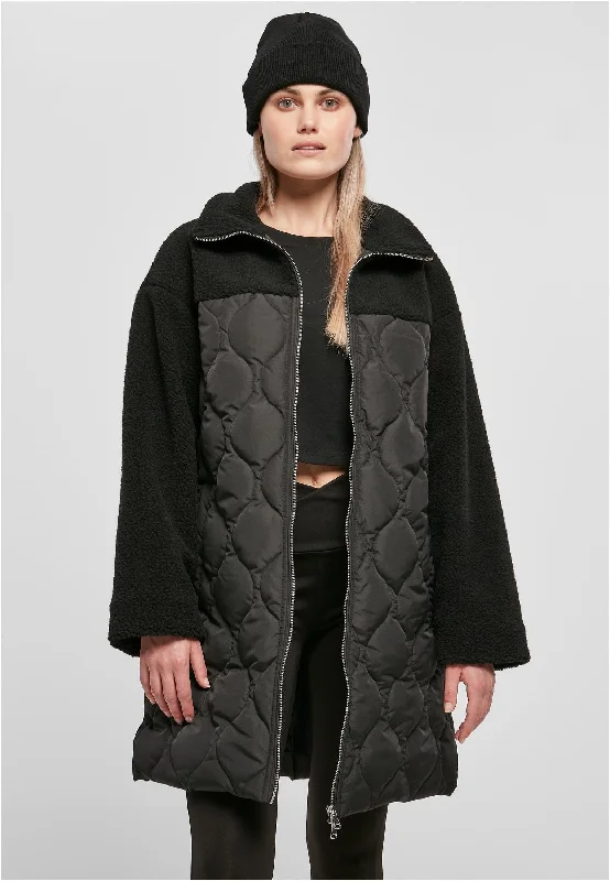Printed jackets with a floral - watercolor pattern for a romantic lookUrban Classics - Ladies Oversized Sherpa Quilted Black - Jacket Printed jackets with a floral - watercolor pattern for a romantic lookUrban Classics - Ladies Oversized Sherpa Quilted Black - Jacket