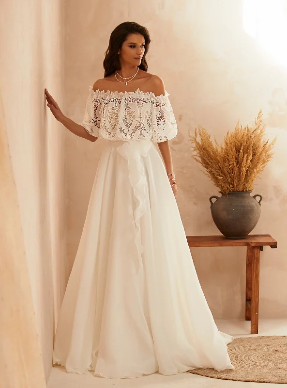 Wedding Dresses with Rhinestone Embellishments and Sheer Sleeves and Tulle Skirt for a Luxurious and Alluring LookAUGUST Wedding Dresses with Rhinestone Embellishments and Sheer Sleeves and Tulle Skirt for a Luxurious and Alluring LookAUGUST