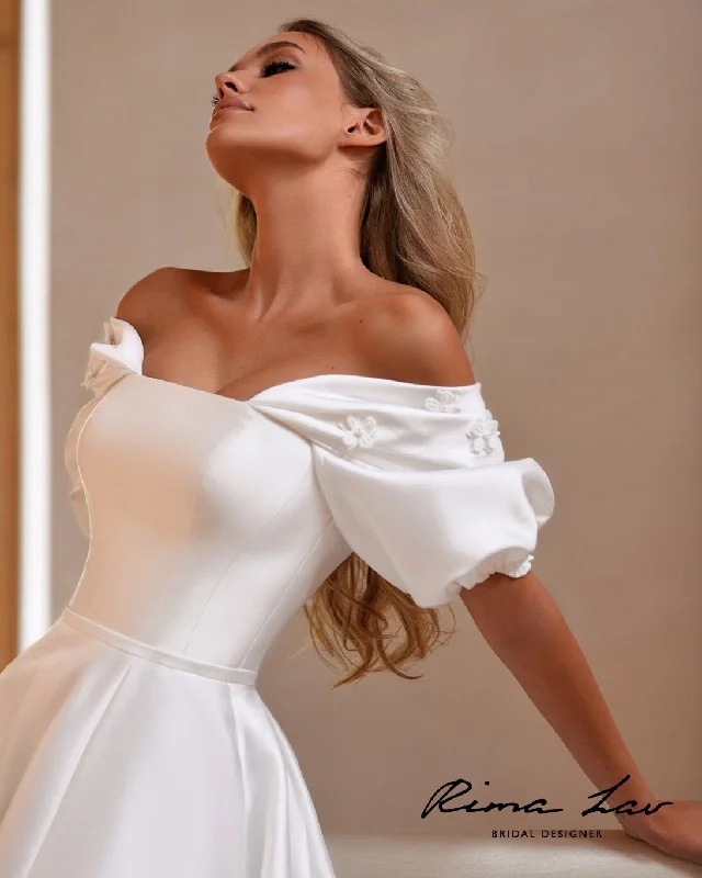 Wedding Dresses with Sheer Panels and Beaded Trim and Bow at the Back and Embroidered Paisley Patterns for a Sexy and Exotic LookLusine Wedding Dresses with Sheer Panels and Beaded Trim and Bow at the Back and Embroidered Paisley Patterns for a Sexy and Exotic LookLusine