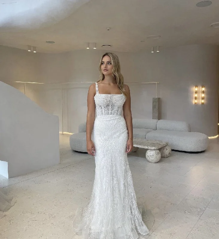 Wedding Dresses with Sequined Fringe and Tulle Overlay and High Low Hem for a Dazzling and Playful LookCorston Couture Daydreaming Wedding Dresses with Sequined Fringe and Tulle Overlay and High Low Hem for a Dazzling and Playful LookCorston Couture Daydreaming