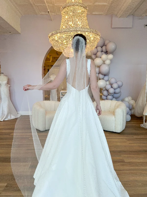 Wedding Dresses with Satin Trimmed Collar and Bow Back and Embroidered Skirt and Sequined Bodice and Belt for a Classic and Glamorous LookCourtyard Length Veil Wedding Dresses with Satin Trimmed Collar and Bow Back and Embroidered Skirt and Sequined Bodice and Belt for a Classic and Glamorous LookCourtyard Length Veil