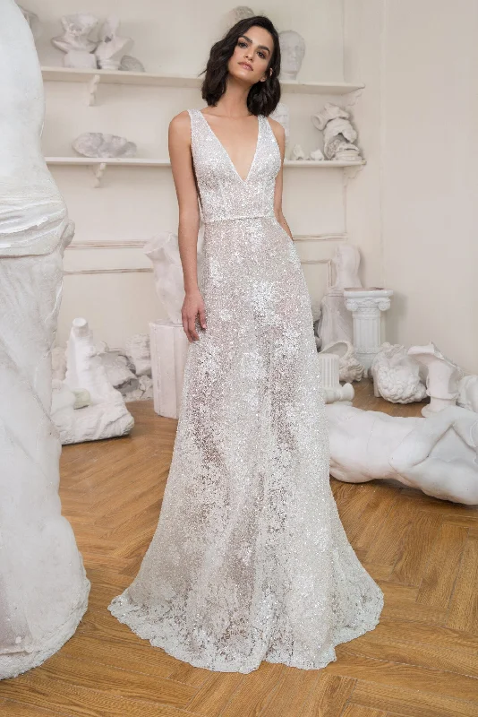 Wedding Dresses with Ruffled Sleeveless Top and Sequined Bodice and Tulle Skirt and Beaded Waistband and Bow at the Back for a Dramatic and Glamorous LookDany Tabet Phoebe - Size 12 Wedding Dresses with Ruffled Sleeveless Top and Sequined Bodice and Tulle Skirt and Beaded Waistband and Bow at the Back for a Dramatic and Glamorous LookDany Tabet Phoebe - Size 12