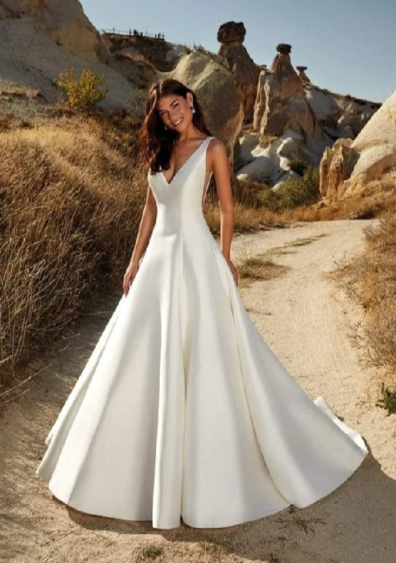 Wedding Dresses with Rhinestone Embellishments and Sheer Sleeves and Tulle Skirt for a Luxurious and Alluring LookEddy K. Charlotte - Size 12 Wedding Dresses with Rhinestone Embellishments and Sheer Sleeves and Tulle Skirt for a Luxurious and Alluring LookEddy K. Charlotte - Size 12