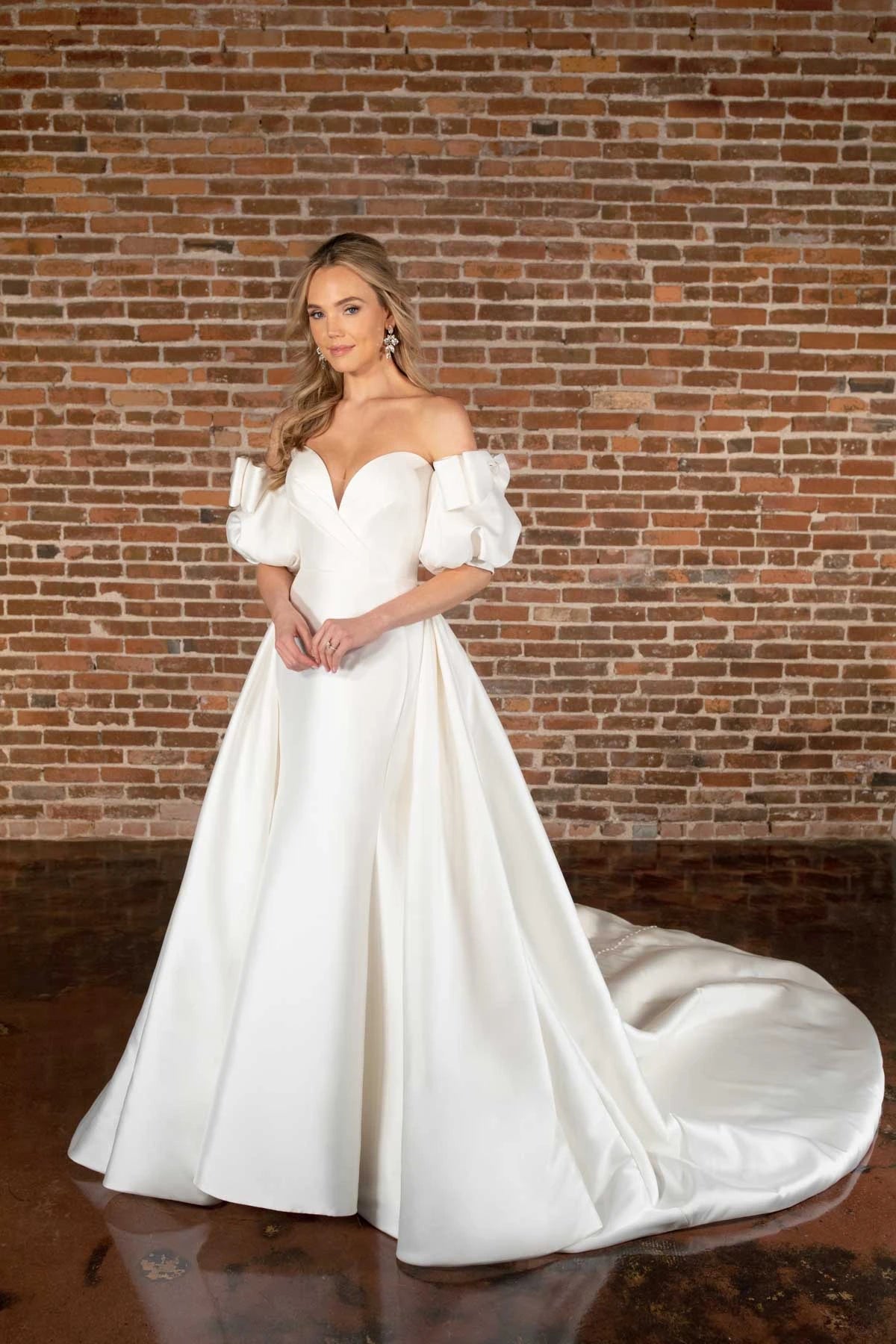 Wedding Dresses with Satin and Lace Trimmed Neckline and Ruffled Sleeves and Embroidered Skirt and Bow at the Back and Belt for a Sophisticated and Girly LookEssense of Australia D3822