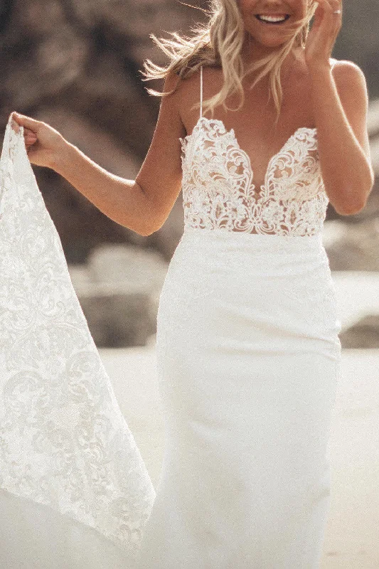 Wedding Dresses with Satin Trimmed Collar and Ruffled Hem and Bow at the Waist for a Classic and Girly LookGoddess By Nature Samara Gown Wedding Dresses with Satin Trimmed Collar and Ruffled Hem and Bow at the Waist for a Classic and Girly LookGoddess By Nature Samara Gown