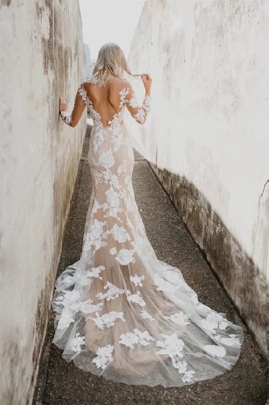 Wedding Dresses with High Low Sheer Skirt and Embroidered Birds and Sequined Floral Motifs for a Nature Inspired and Dramatic LookGoddess By Nature Vivienne Gown Wedding Dresses with High Low Sheer Skirt and Embroidered Birds and Sequined Floral Motifs for a Nature Inspired and Dramatic LookGoddess By Nature Vivienne Gown
