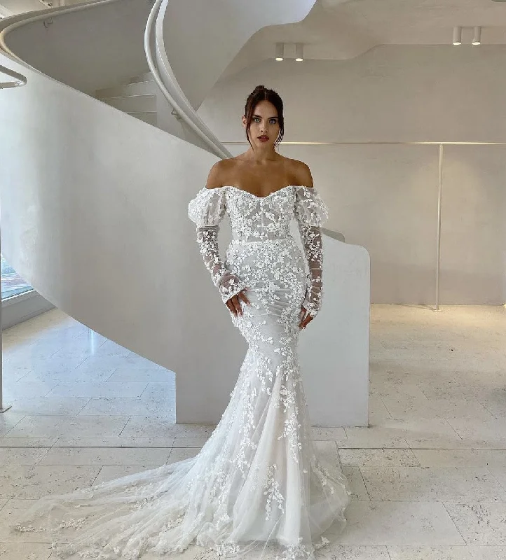 Wedding Dresses with Lace Insertions on the Skirt and Beaded Waistband and Ruffled Hem and Bow at the Waist and Embroidered Floral Patterns for a Feminine and Flirty LookLiz Martinez Antonella Wedding Dresses with Lace Insertions on the Skirt and Beaded Waistband and Ruffled Hem and Bow at the Waist and Embroidered Floral Patterns for a Feminine and Flirty LookLiz Martinez Antonella