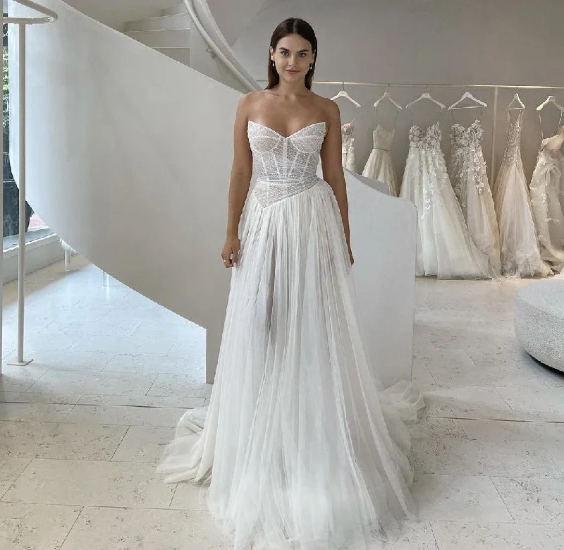 Wedding Dresses with Satin and Lace Trimmed Neckline and Ruffled Sleeves and Embroidered Skirt and Bow at the Back and Belt for a Sophisticated and Girly LookLiz Martinez Haven Wedding Dresses with Satin and Lace Trimmed Neckline and Ruffled Sleeves and Embroidered Skirt and Bow at the Back and Belt for a Sophisticated and Girly LookLiz Martinez Haven