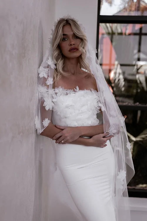 Wedding Dresses with Metallic Sequined Bodice and Chiffon Skirt and Ruffled Hem and Sheer Back for a Glamorous and Flirty LookMade With Love Marley Wedding Dresses with Metallic Sequined Bodice and Chiffon Skirt and Ruffled Hem and Sheer Back for a Glamorous and Flirty LookMade With Love Marley