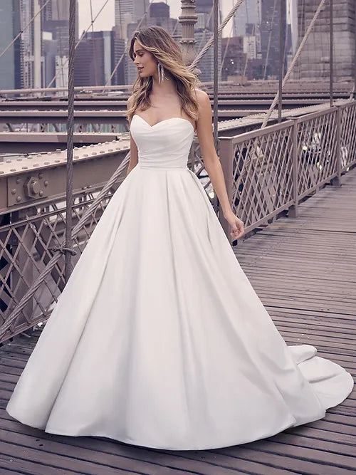 Halter Neck Wedding Dresses with High Low Hem for a Modern TwistMaggie Sottero Anniston Marie Halter Neck Wedding Dresses with High Low Hem for a Modern TwistMaggie Sottero Anniston Marie