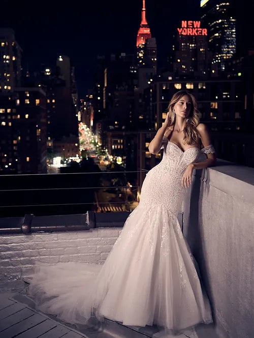 Wedding Dresses with Embroidered Birds and Sequined Floral Motifs and Satin and Lace Combo and Bow at the Waist and Embroidered Floral Patterns for a Nature Inspired and Romantic LookMaggie Sottero Danielle Wedding Dresses with Embroidered Birds and Sequined Floral Motifs and Satin and Lace Combo and Bow at the Waist and Embroidered Floral Patterns for a Nature Inspired and Romantic LookMaggie Sottero Danielle