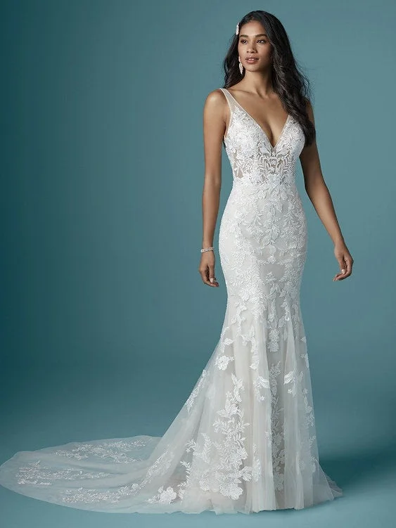 Wedding Dresses with High Low Sheer Skirt and Embroidered Birds and Sequined Floral Motifs for a Nature Inspired and Dramatic LookMaggie Sottero Greenley Wedding Dresses with High Low Sheer Skirt and Embroidered Birds and Sequined Floral Motifs for a Nature Inspired and Dramatic LookMaggie Sottero Greenley