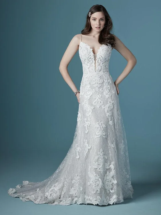 Wedding Dresses with Embroidered Birds and Sequined Floral Motifs and Satin and Lace Combo and Bow at the Waist for a Nature Inspired and Romantic LookMaggie Sottero Tuscany Lane Wedding Dresses with Embroidered Birds and Sequined Floral Motifs and Satin and Lace Combo and Bow at the Waist for a Nature Inspired and Romantic LookMaggie Sottero Tuscany Lane