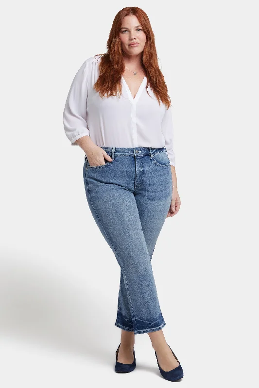 Denim jeans with a contrast - stitching detail for a pop of colorMarilyn Straight Ankle Jeans In Plus Size - Torrent Peak Denim jeans with a contrast - stitching detail for a pop of colorMarilyn Straight Ankle Jeans In Plus Size - Torrent Peak