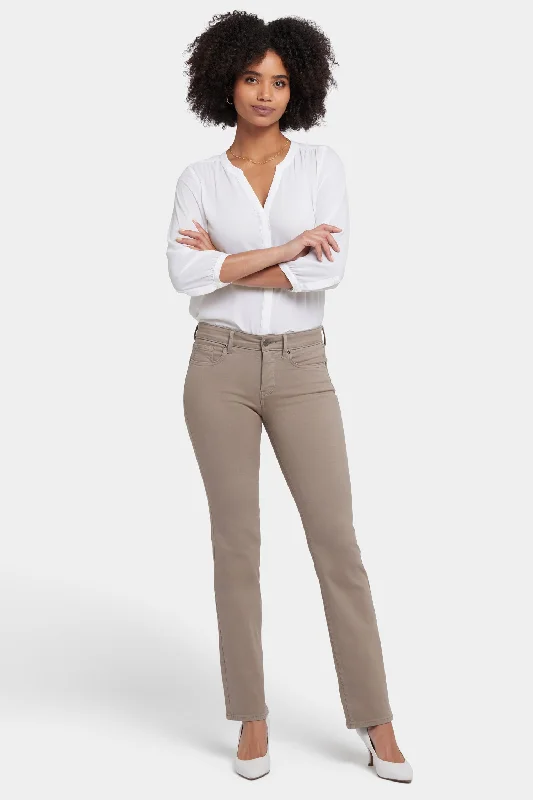 Denim jeans for a business - casual setting when paired with a blazer and dress shoesMarilyn Straight Jeans In Long Inseam - Saddlewood Denim jeans for a business - casual setting when paired with a blazer and dress shoesMarilyn Straight Jeans In Long Inseam - Saddlewood