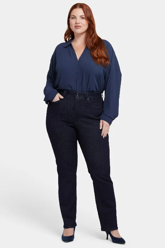 Denim jeans for a photography shoot for a trendy and edgy lookMarilyn Straight Jeans In Plus Size - Magical Denim jeans for a photography shoot for a trendy and edgy lookMarilyn Straight Jeans In Plus Size - Magical