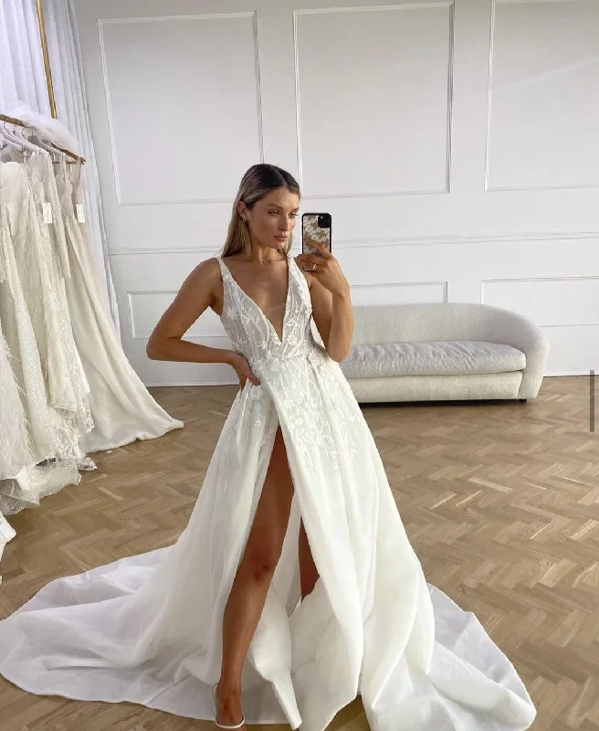 Strapless Wedding Dresses with Tassel Accents and Sequined Belt for a Fun LookMarquise Bridal Xavier V Strapless Wedding Dresses with Tassel Accents and Sequined Belt for a Fun LookMarquise Bridal Xavier V
