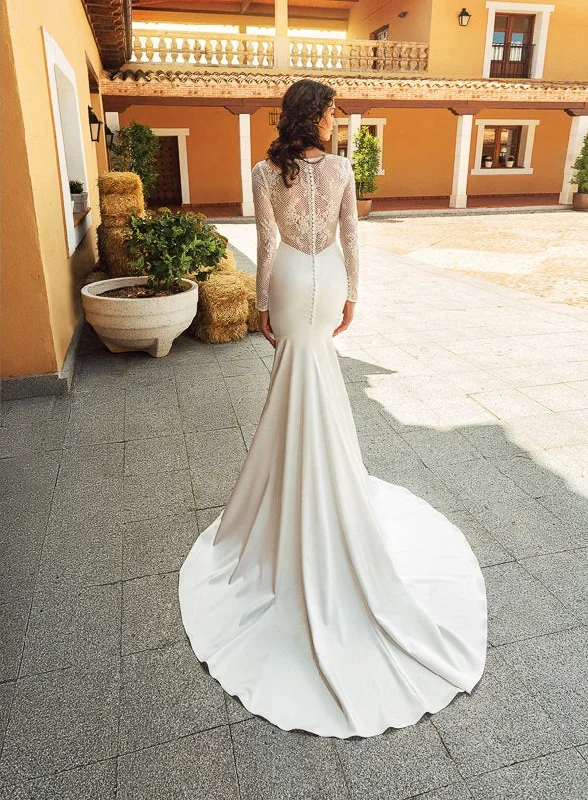 Wedding Dresses with Pleated Tulle Skirt and Sequined Geometric Shapes and Lace Overlay and Bow at the Waist and Embroidered Floral Patterns for a Princess and Feminine LookCarolina Wedding Dresses with Pleated Tulle Skirt and Sequined Geometric Shapes and Lace Overlay and Bow at the Waist and Embroidered Floral Patterns for a Princess and Feminine LookCarolina