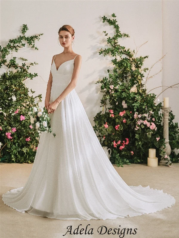 Wedding Dresses with Ruffled Sleeveless Top and Embroidered Skirt and Sequined Bodice for a Dramatic and Artistic LookValencia Wedding Dresses with Ruffled Sleeveless Top and Embroidered Skirt and Sequined Bodice for a Dramatic and Artistic LookValencia