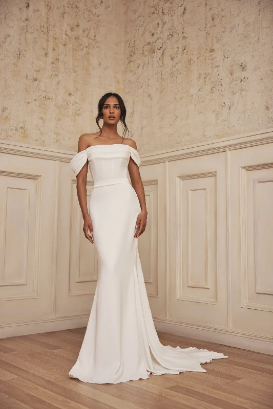 Wedding Dresses with Sheer Panels and Beaded Trim and Embroidered Paisley Patterns and Ruffled Hem and Belt and Embroidered Floral Patterns for a Sultry and Exotic LookPavo Wedding Dresses with Sheer Panels and Beaded Trim and Embroidered Paisley Patterns and Ruffled Hem and Belt and Embroidered Floral Patterns for a Sultry and Exotic LookPavo