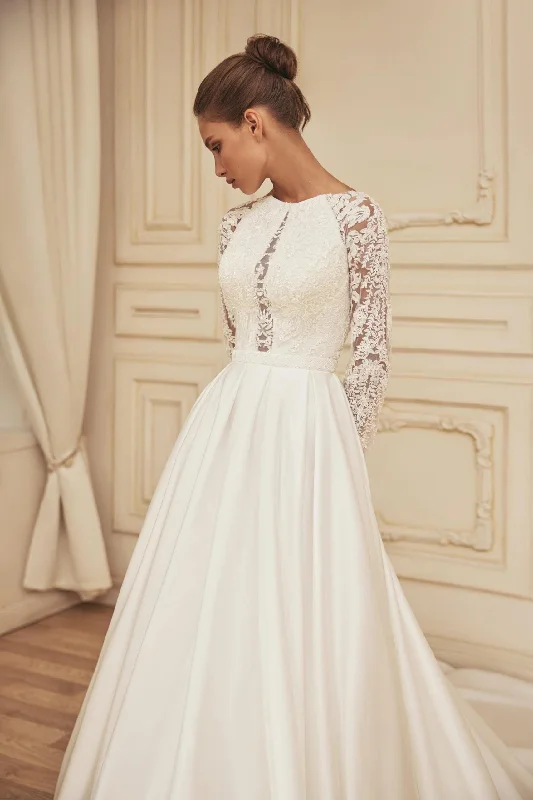 Sleeveless Wedding Dresses with Sequined Neckline and Back for a Glamorous LookVela Sleeveless Wedding Dresses with Sequined Neckline and Back for a Glamorous LookVela