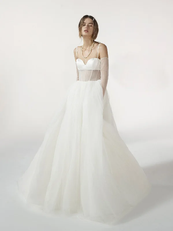 Wedding Dresses with Embroidered Floral Patterns and Tassel Hem and Sequined Bodice and Satin Sash for a Bohemian and Glamorous LookVera Wang Floreal Wedding Dresses with Embroidered Floral Patterns and Tassel Hem and Sequined Bodice and Satin Sash for a Bohemian and Glamorous LookVera Wang Floreal