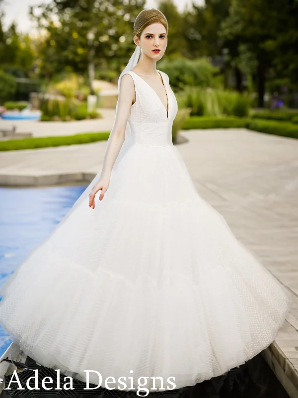 Wedding Dresses with Tulle Overlay and Beaded Bodice and High Low Hem and Embroidered Birds for a Dramatic and Graceful LookSeraphina Wedding Dresses with Tulle Overlay and Beaded Bodice and High Low Hem and Embroidered Birds for a Dramatic and Graceful LookSeraphina