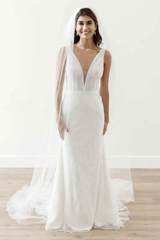 Wedding Dresses with Tassel Hem and Metallic Lace and Sequined Geometric Shapes and Satin Ribbon for a Boho and Luxurious LookWtoo Foster - 10810 Wedding Dresses with Tassel Hem and Metallic Lace and Sequined Geometric Shapes and Satin Ribbon for a Boho and Luxurious LookWtoo Foster - 10810