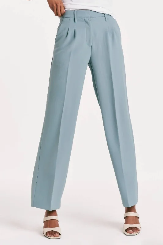 Ripped boyfriend jeans for women in a casual and cool styleAdelaide Effortless Trouser In Blue Ripped boyfriend jeans for women in a casual and cool styleAdelaide Effortless Trouser In Blue