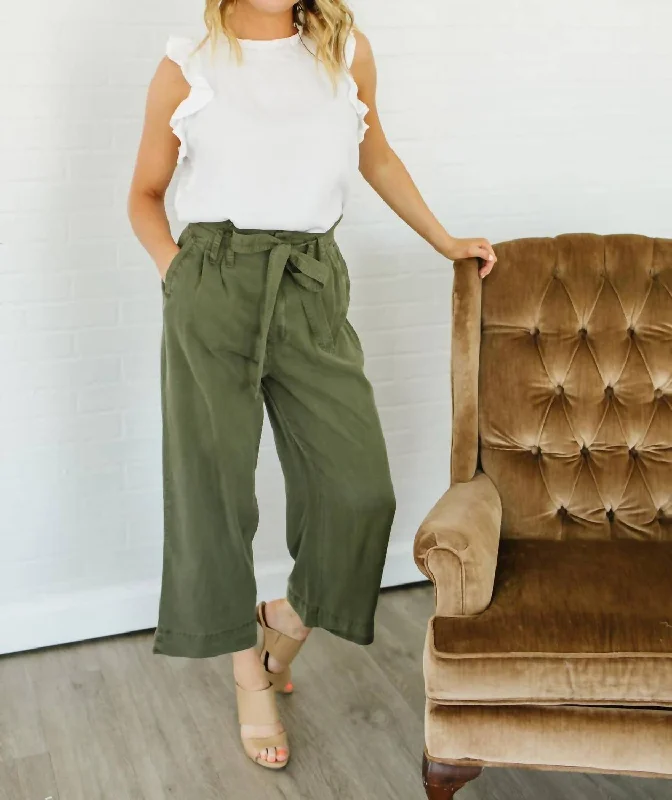Sequined palazzo pants for women in a glamorous and party - ready styleAmandine Paperbag Pants In Olive Sequined palazzo pants for women in a glamorous and party - ready styleAmandine Paperbag Pants In Olive