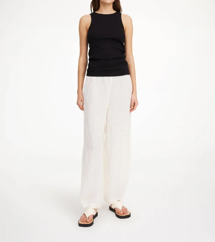 Metallic wide leg dress pants for women in a shiny and glamorous styleMikele Organic Linen Trouser Pants In Pure White Metallic wide leg dress pants for women in a shiny and glamorous styleMikele Organic Linen Trouser Pants In Pure White