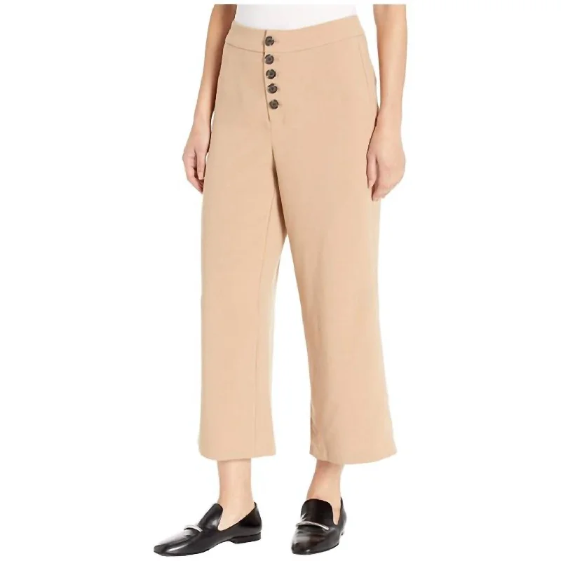 Ripped boyfriend jeans for women in a casual and cool styleRiga Button Front Wide Leg Trouser In Caramel Ripped boyfriend jeans for women in a casual and cool styleRiga Button Front Wide Leg Trouser In Caramel
