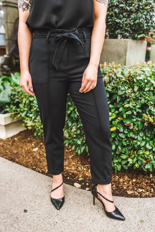 Metallic wide leg pants for women in a shiny and glamorous styleTegan Paperbag Trousers In Black Metallic wide leg pants for women in a shiny and glamorous styleTegan Paperbag Trousers In Black