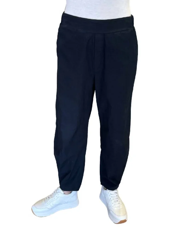 Drawstring wide leg pants for women in a casual and relaxed styleWomen's Pleated Hem Trousers In New Navy Drawstring wide leg pants for women in a casual and relaxed styleWomen's Pleated Hem Trousers In New Navy