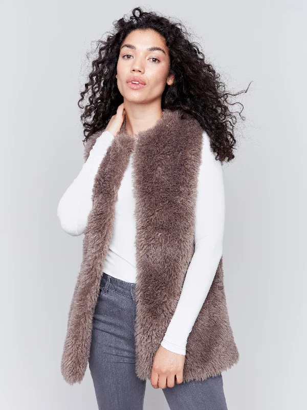 Denim jackets with a rolled - up sleeve detail for a casual, laid - back lookLong Faux Fur Vest - Taupe Denim jackets with a rolled - up sleeve detail for a casual, laid - back lookLong Faux Fur Vest - Taupe