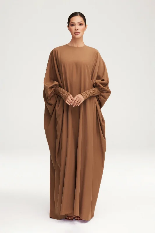Maxi Dresses with Metallic Thread Embroidery for a Shiny and Luxurious LookSuha Smocked Sleeve Kaftan - Dark Chai Maxi Dresses with Metallic Thread Embroidery for a Shiny and Luxurious LookSuha Smocked Sleeve Kaftan - Dark Chai