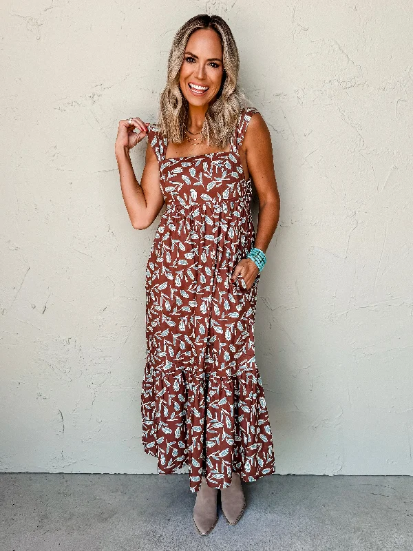 Midi dress for a movie night with a cozy sweater or jacketCoffee And Friends Floral Midi Dress Midi dress for a movie night with a cozy sweater or jacketCoffee And Friends Floral Midi Dress
