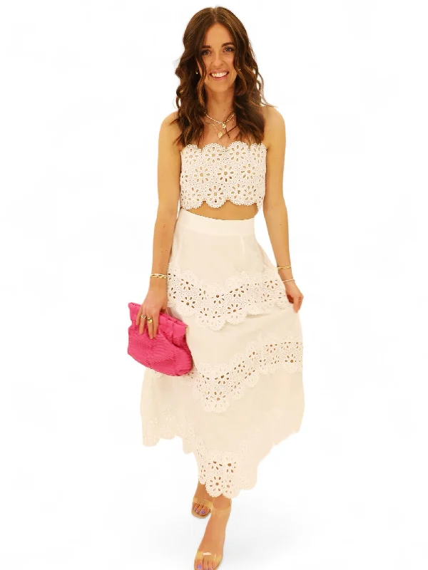 Sleeveless silk midi dress for a sophisticated summer styleRhodes Eyelet Midi Skirt Sleeveless silk midi dress for a sophisticated summer styleRhodes Eyelet Midi Skirt