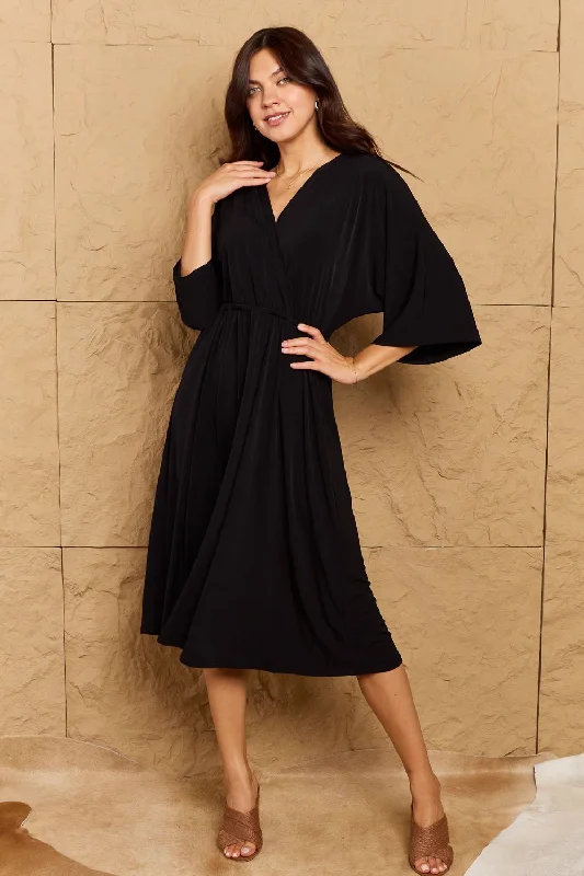 Fringe - trimmed midi dress for a playful and trendy appearanceMake Your Move Solid Surplice Black Midi Dress Fringe - trimmed midi dress for a playful and trendy appearanceMake Your Move Solid Surplice Black Midi Dress
