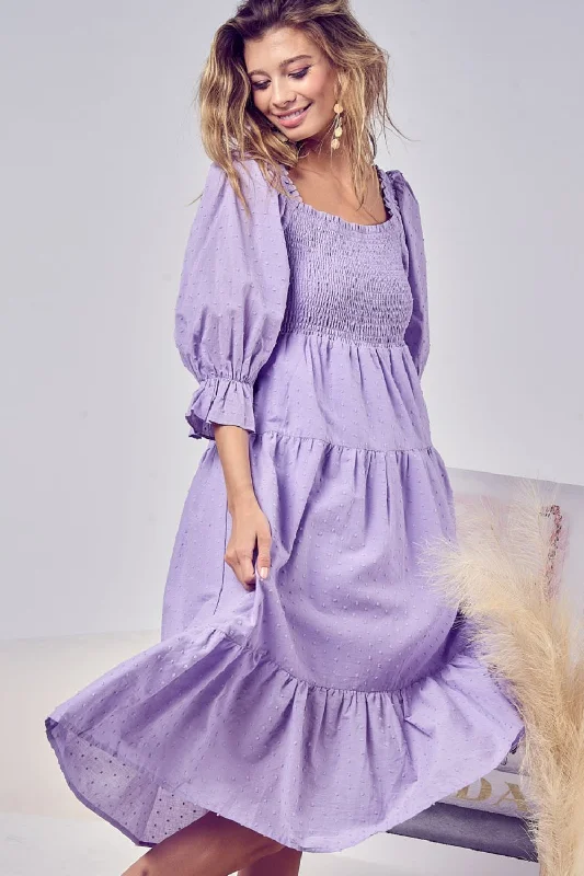 Midi dress for a picnic in the park with a relaxed and comfortable fitSwiss Dot Flounce Sleeve Smocked Tiered Midi Dress Midi dress for a picnic in the park with a relaxed and comfortable fitSwiss Dot Flounce Sleeve Smocked Tiered Midi Dress