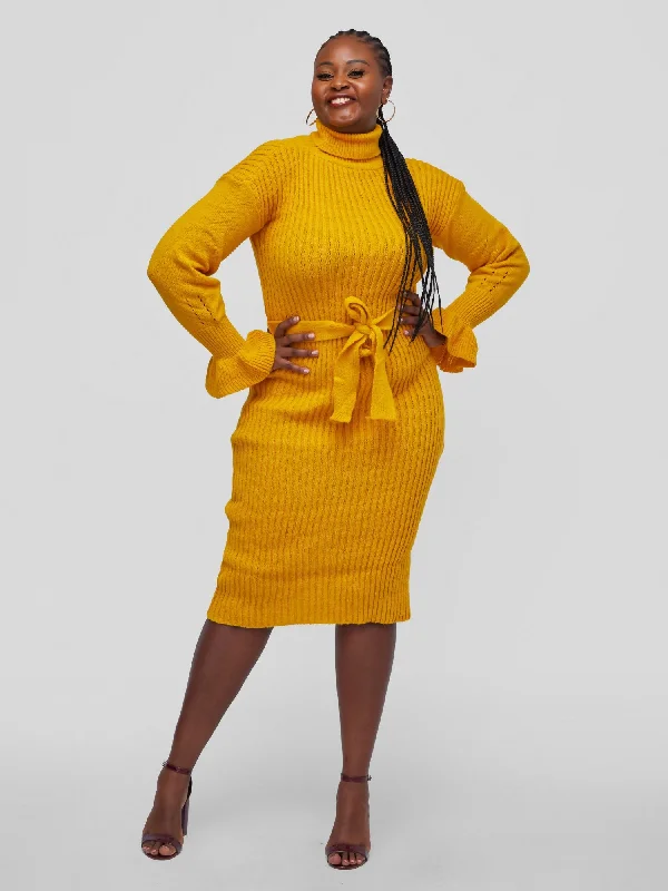 Fringe - trimmed midi dress for a playful and trendy appearanceTuli Nashua Turtle Neck Sweater Dress - Mustard Fringe - trimmed midi dress for a playful and trendy appearanceTuli Nashua Turtle Neck Sweater Dress - Mustard